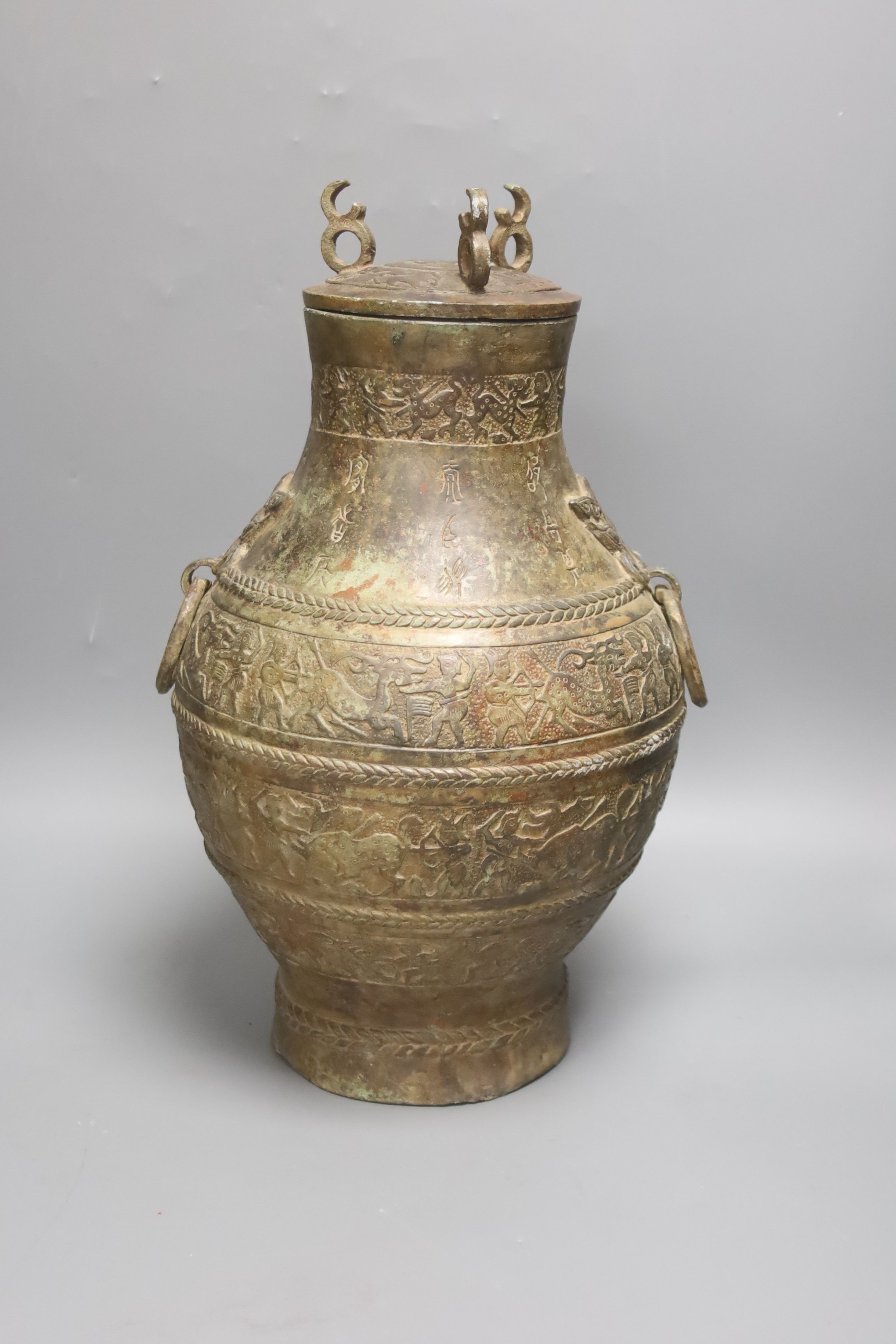 A Chinese cast bronze jar and cover, height 40cm
